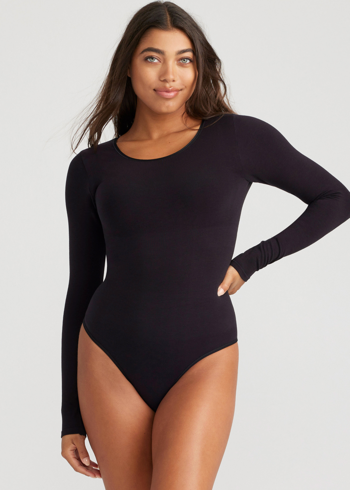 Long Sleeve Shaping Thong Bodysuit - Outlast® Seamless from Yummie in Black  - 1