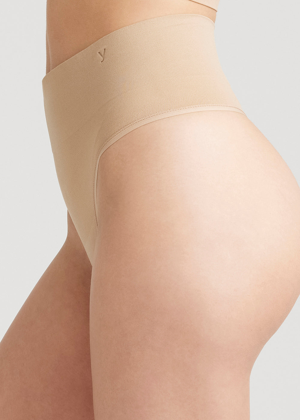 Liliana Comfortably Curved Smoothing Thong - Seamless from Yummie in Almond  - 1