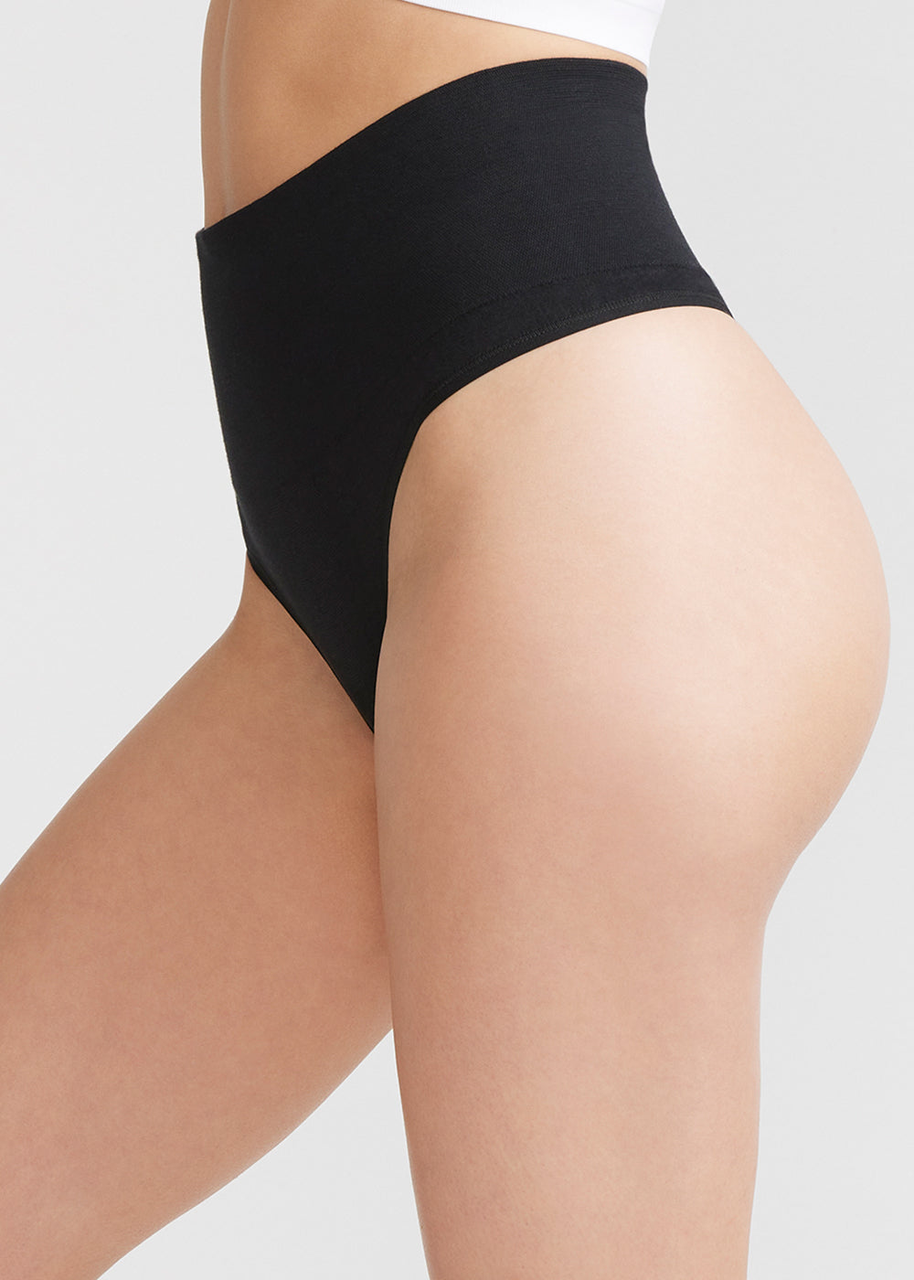 Alex Cotton Shaping Thong - Seamless from Yummie in Black  - 1