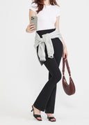 White Lucy Short Sleeve T-Shirt Shaping Bodysuit - Styled with Black Dress Pants & Grey Sweatshirt around waist | Yummie